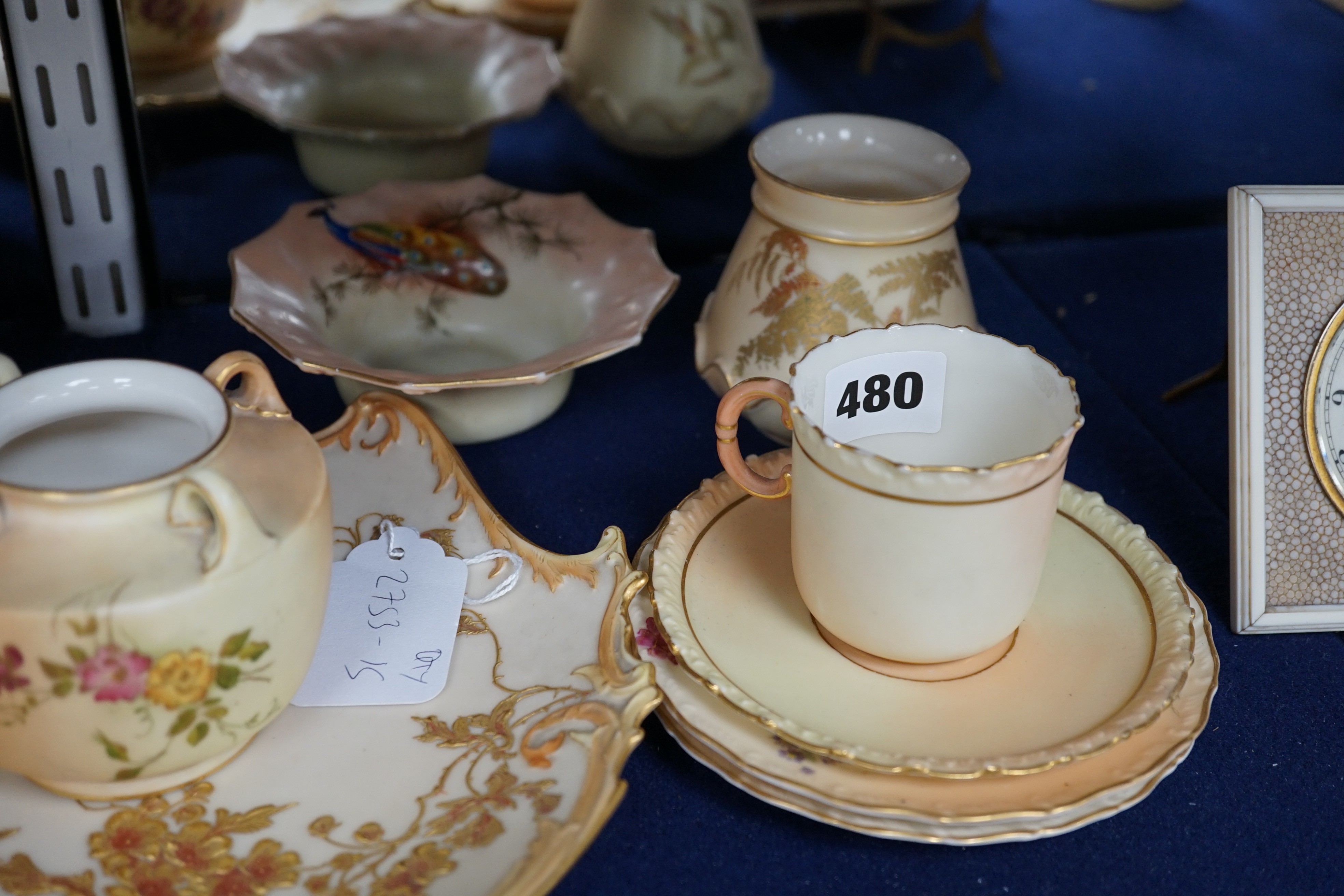A group of ornamental Royal Worcester blush ivory ground items, including a shell dish, 18cm wide, two vases, a dish etc.